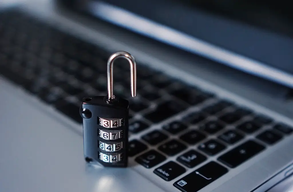 A padlock on top of an open laptop